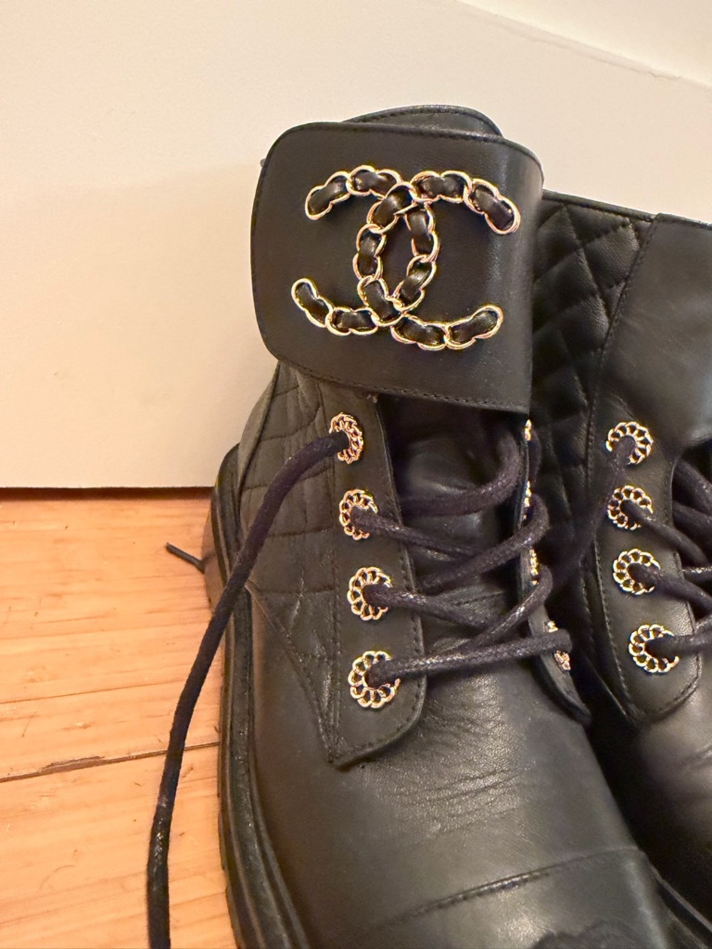 CHANEL Black Leather Quilted Ankle Boots with Gold Chain Accents - Picture 5 of 7